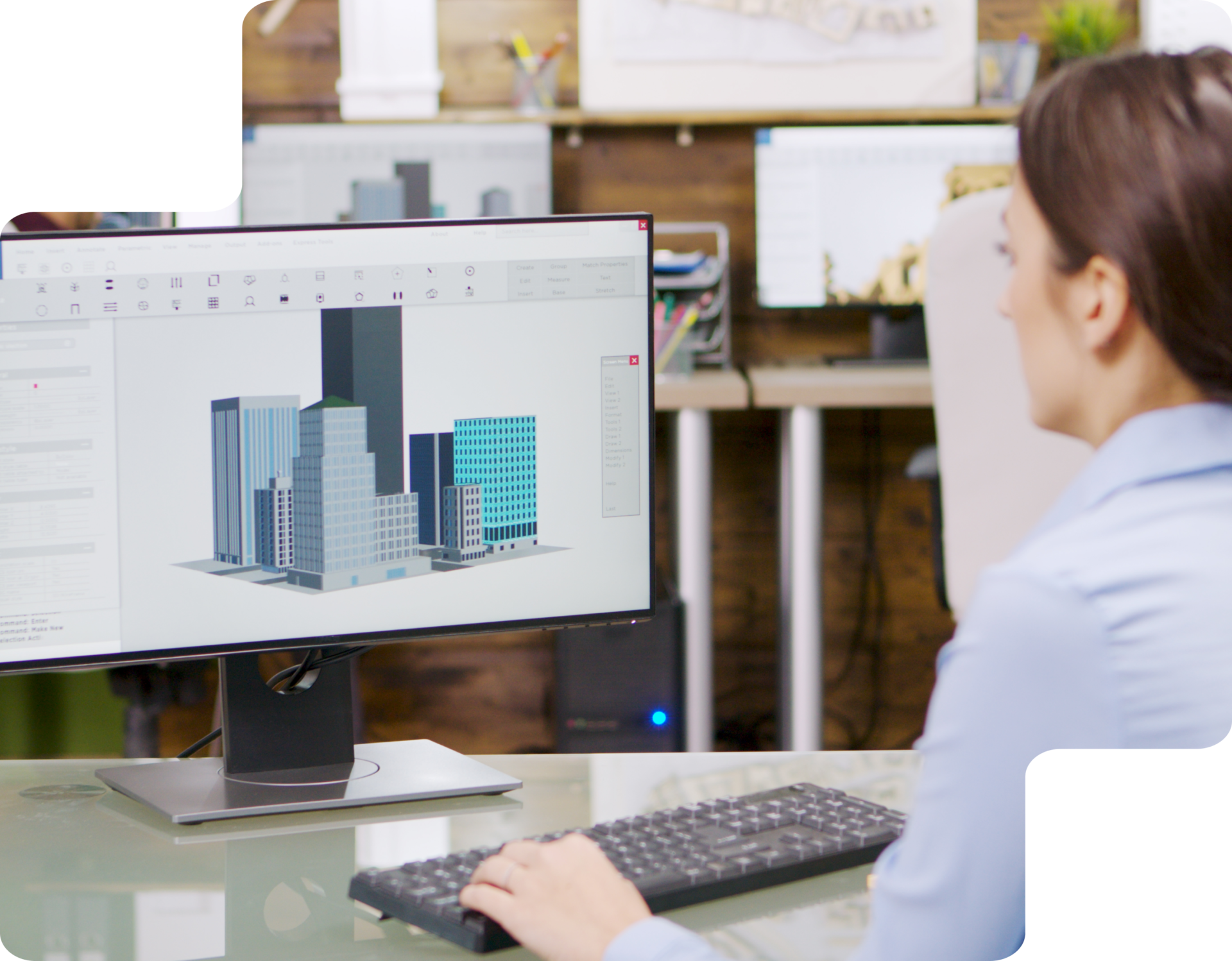 Modélisation de bâtiments en environnement BIM Femme travaillant sur une maquette numérique de bâtiments via un logiciel de modélisation BIM
